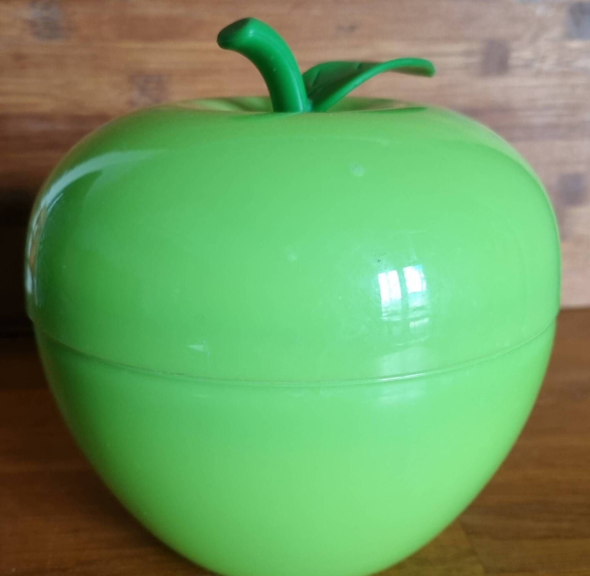 Thermal ice bucket in the shape of a green apple, 1970s style.