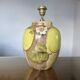 Hubert Olivier ceramic lamp with floral decoration, 1980.