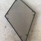 Miroir brutaliste losange en fer