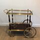 Rolling table in brass and mahogany with removable trays