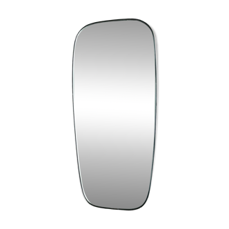 Vintage 1960 free-form mirror known as a retro mirror with a gold and black metal trim.