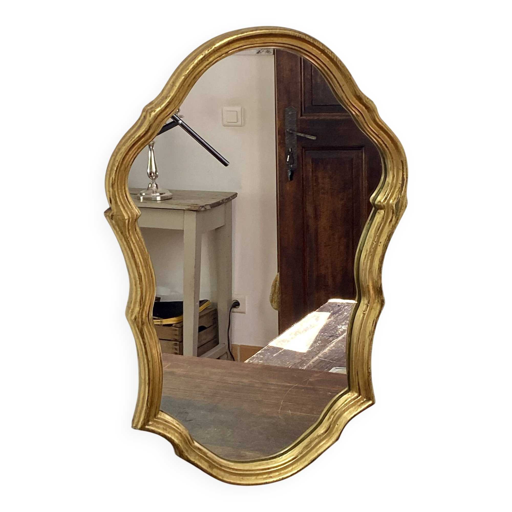 Large baroque mirror in gilded wood
