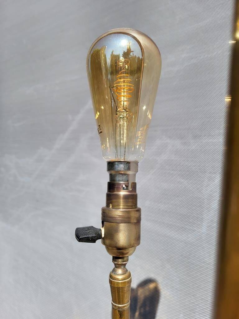 Three-light painter's table lamp in brass from the 1950s.