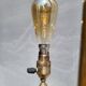 Three-light painter's table lamp in brass from the 1950s.