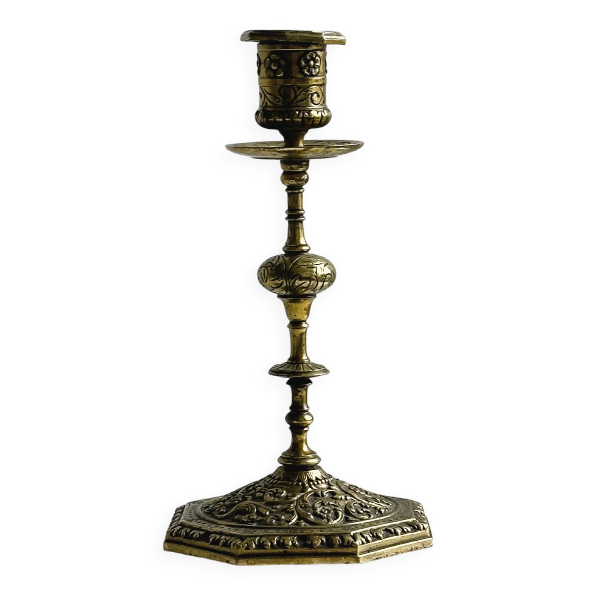 Carved brass candlestick holder