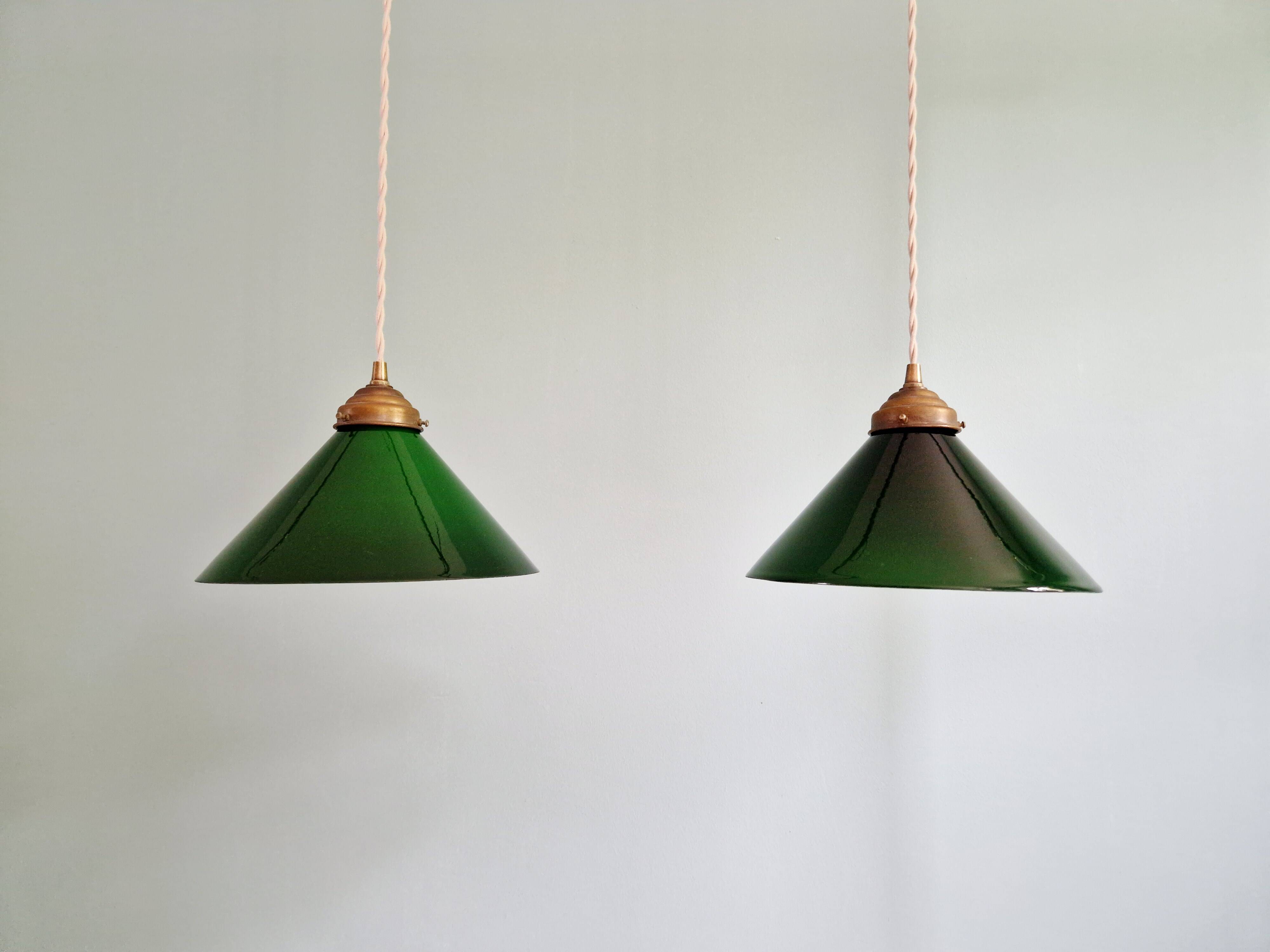 Pair of conical green opaline pendant lights, Art Deco style