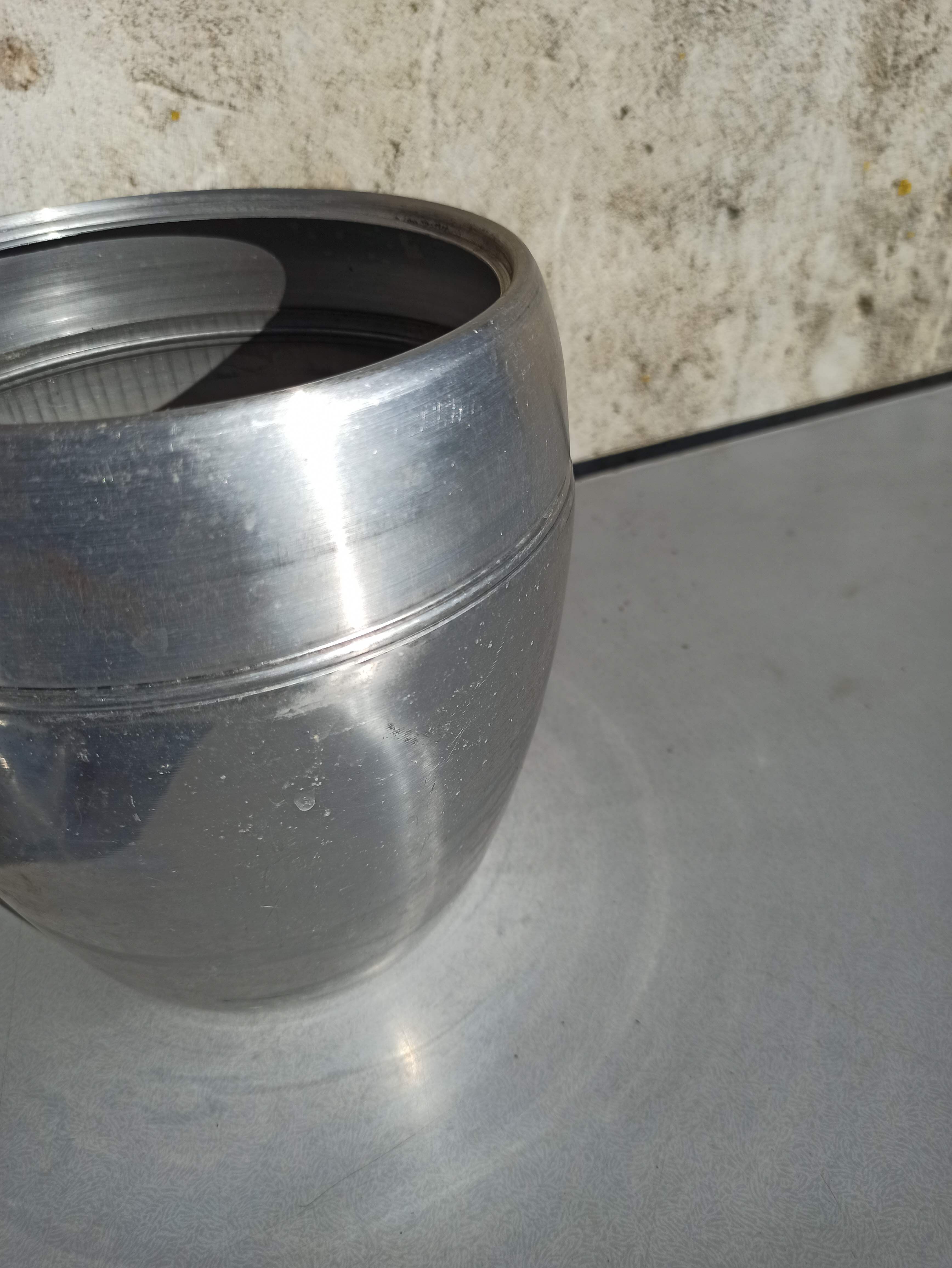 Old ice bucket ice cube in the shape of aluminum pear