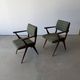 Pair of armchairs with a Scandinavian design in vintage teak from the 1960s.