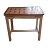 vintage desk or white side table on a red and white tiles