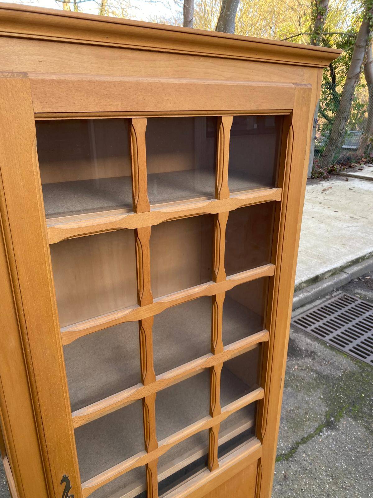 Parisian glass-fronted wardrobe in light wood from the 1960s.