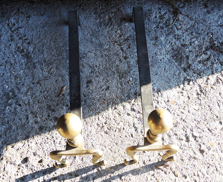 Old brass chenets foot in cabriole