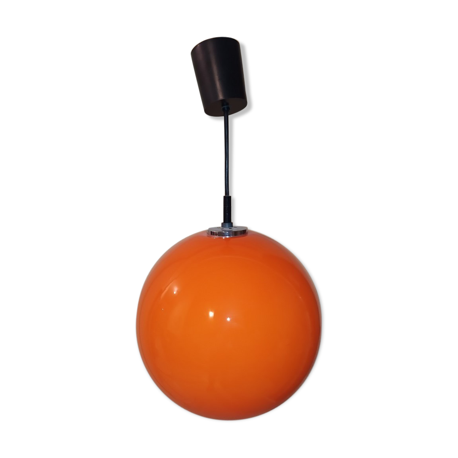 Suspension lamp in orange glass