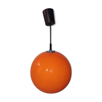 Suspension lamp in orange glass