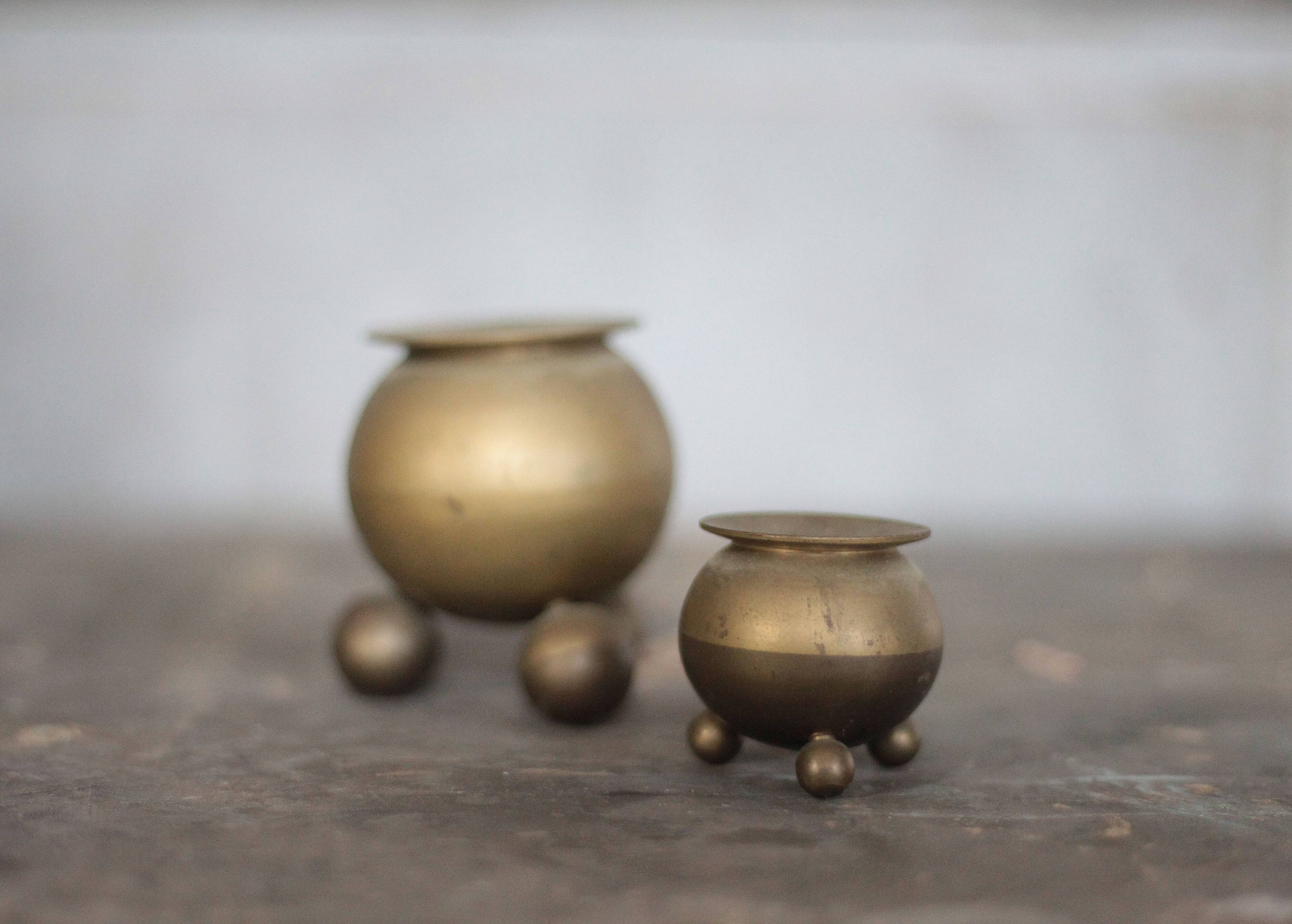 Pair of brass tripod candle holders, Gusum Bruck Sweden, candle holder.