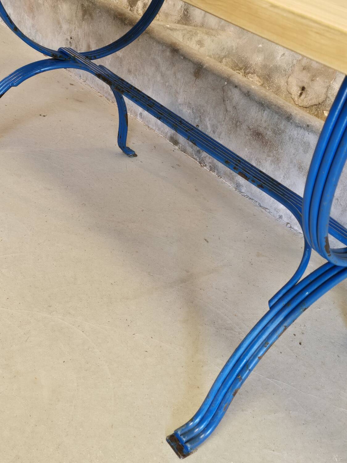 Wrought iron and solid wood table