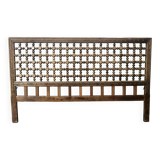 Carved wooden headboard