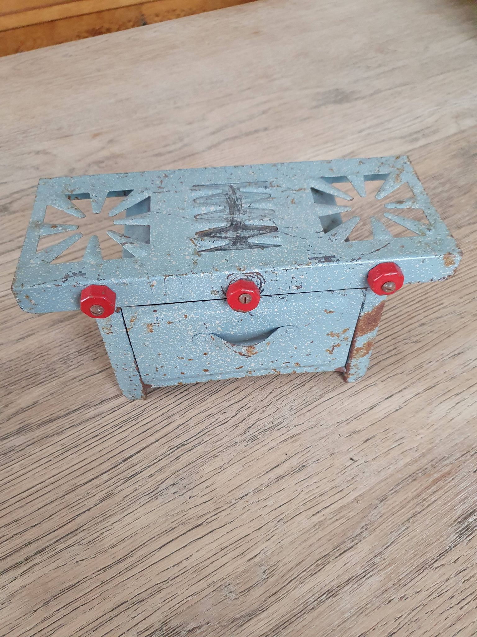 Miniature metal gas stove, (toy from the 1950s)