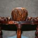 Fauteuil d'angle néo-renaissance en noyer sculpté