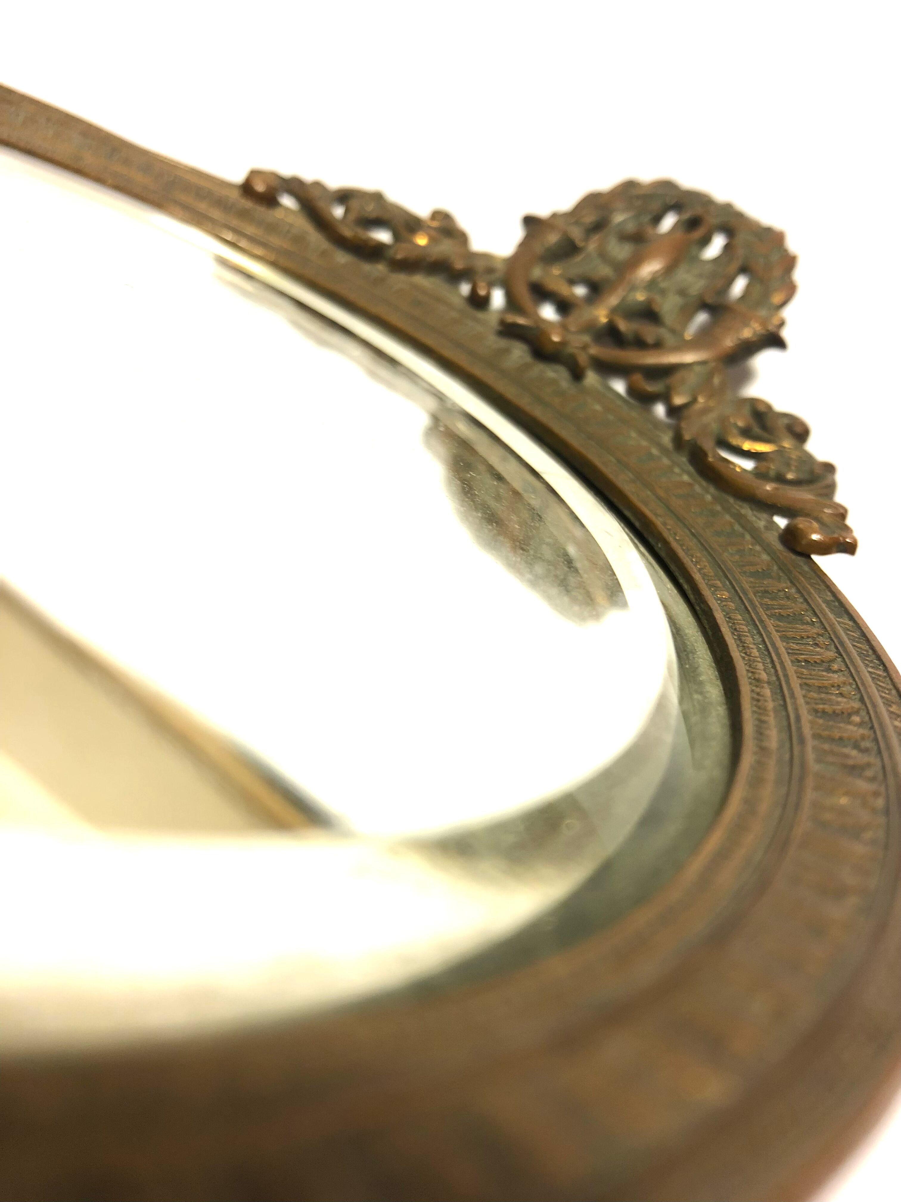 Courtesy hand mirror