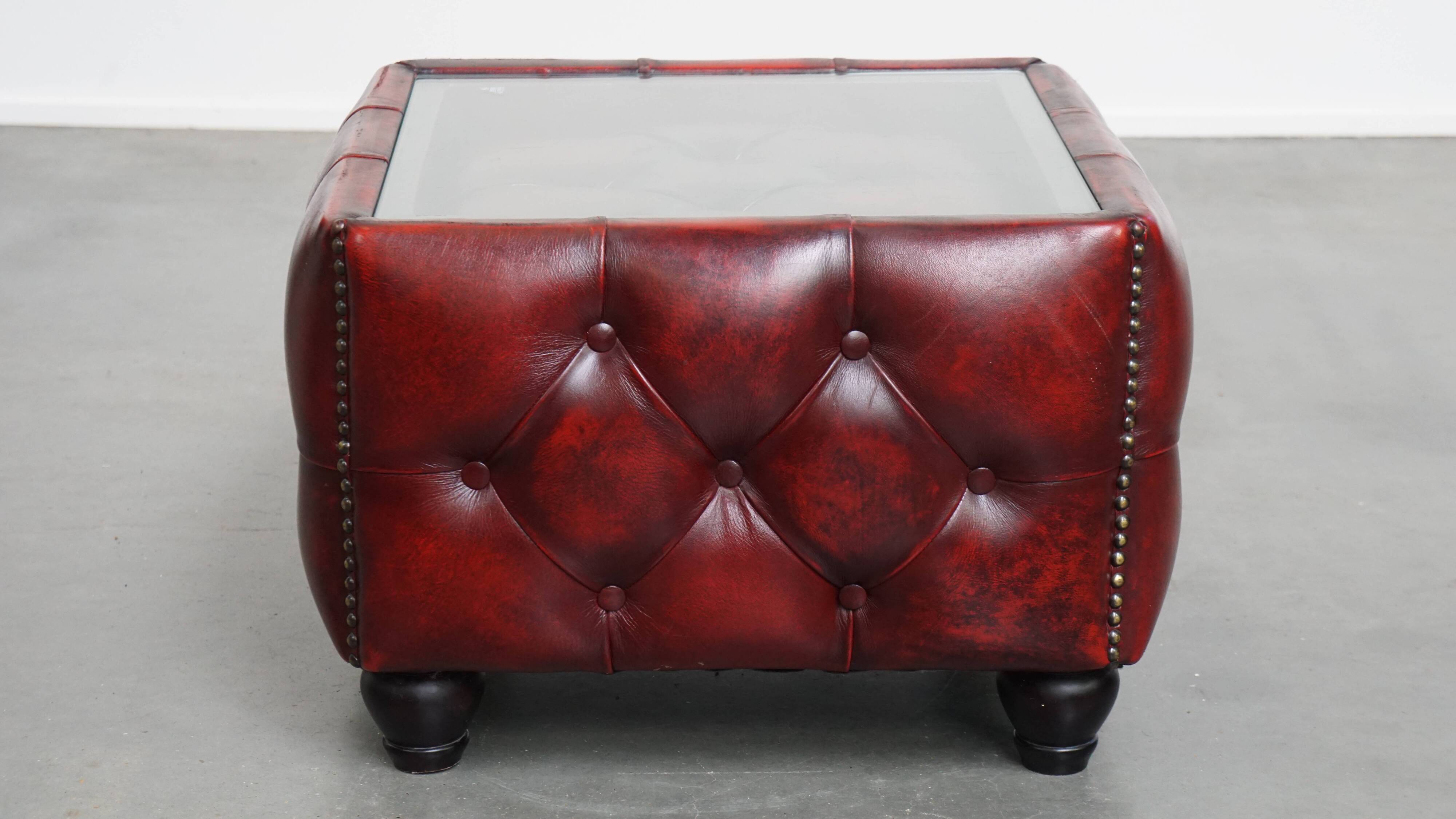 Set of a Red Cowhide Leather Chesterfield Club Chair and Side Table