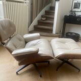 Armchair and footrest by Charles & Ray Eames