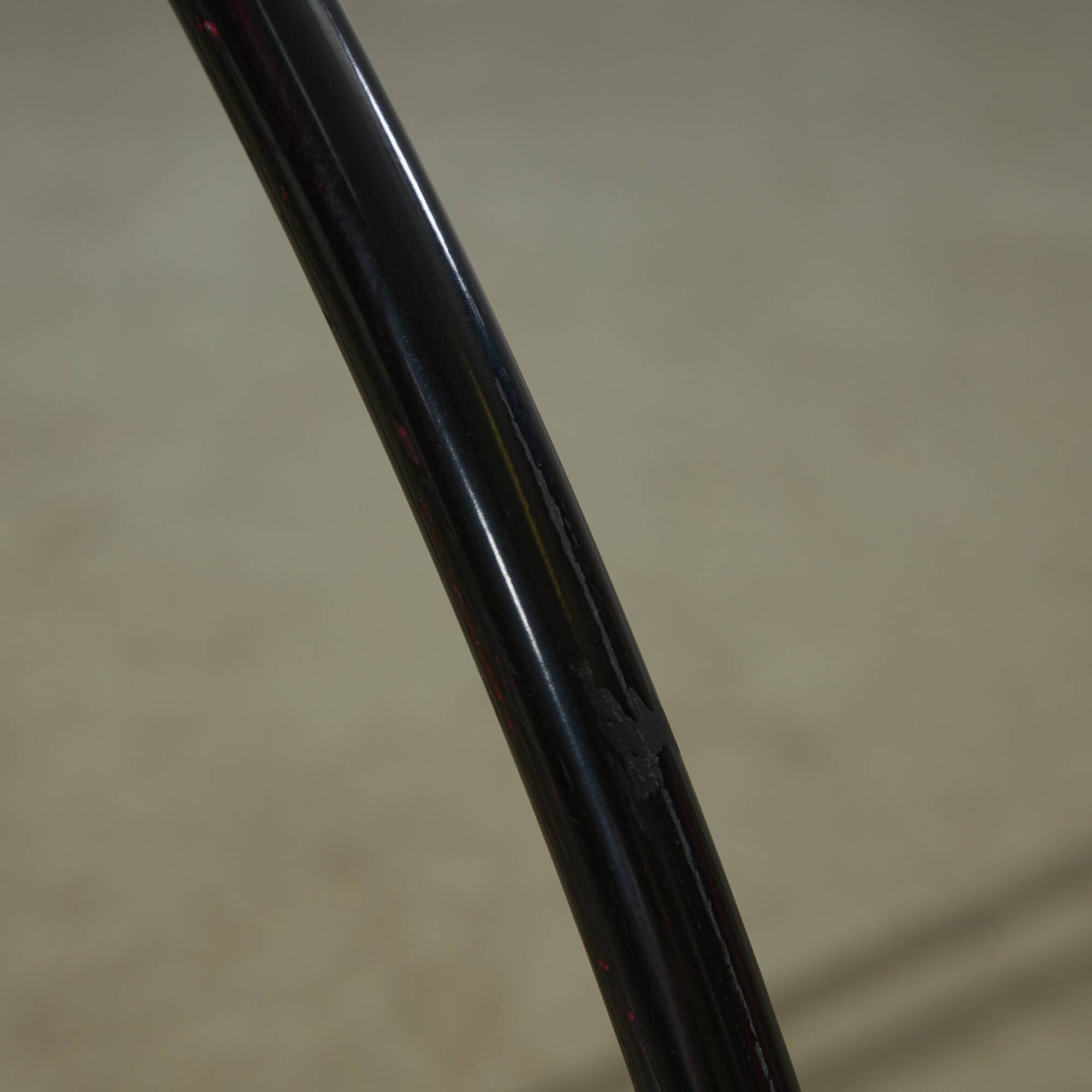 Red Plywood and Curved Metal Frame Chair