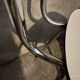 3 white Formica chairs
