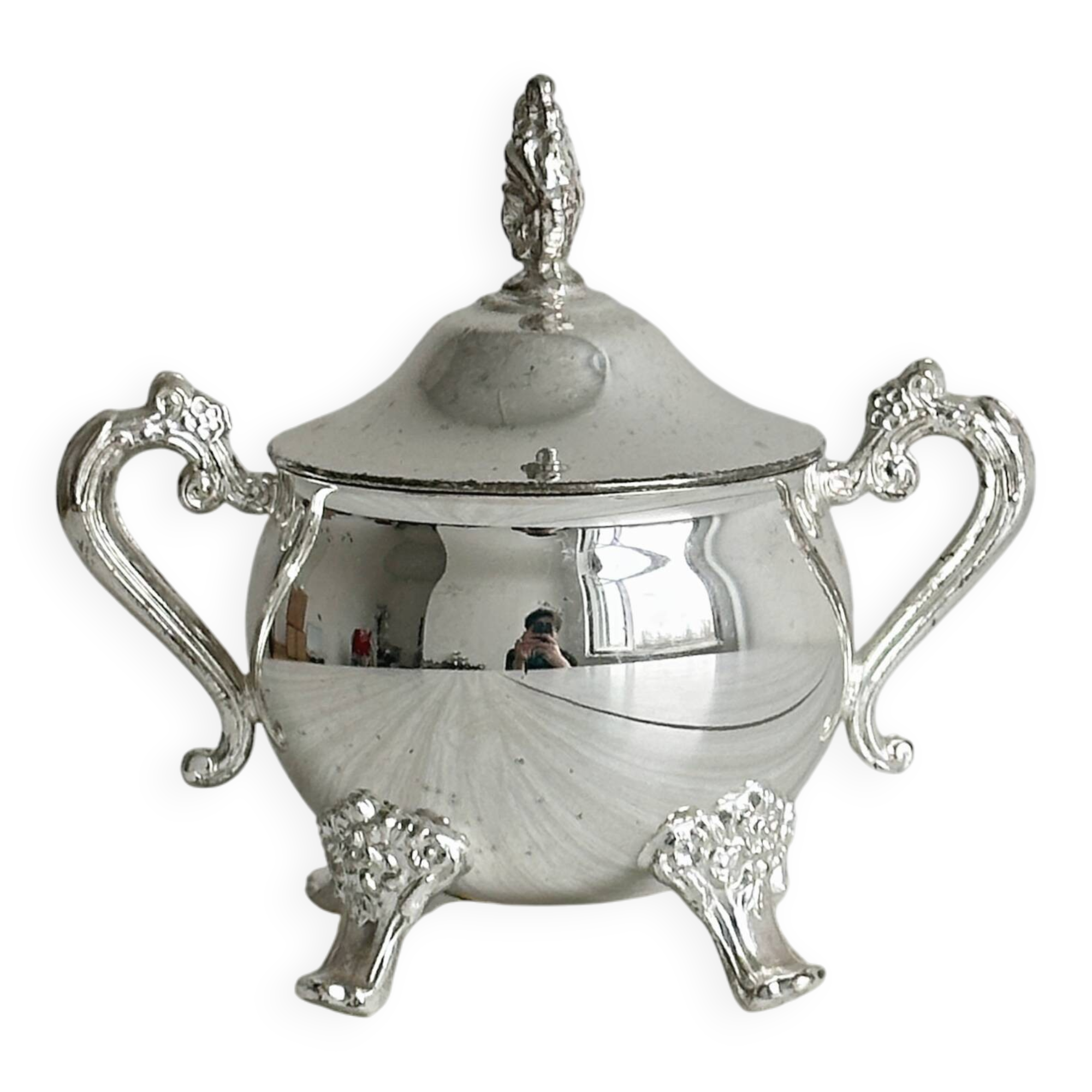 Antique shiny metal sugar bowl