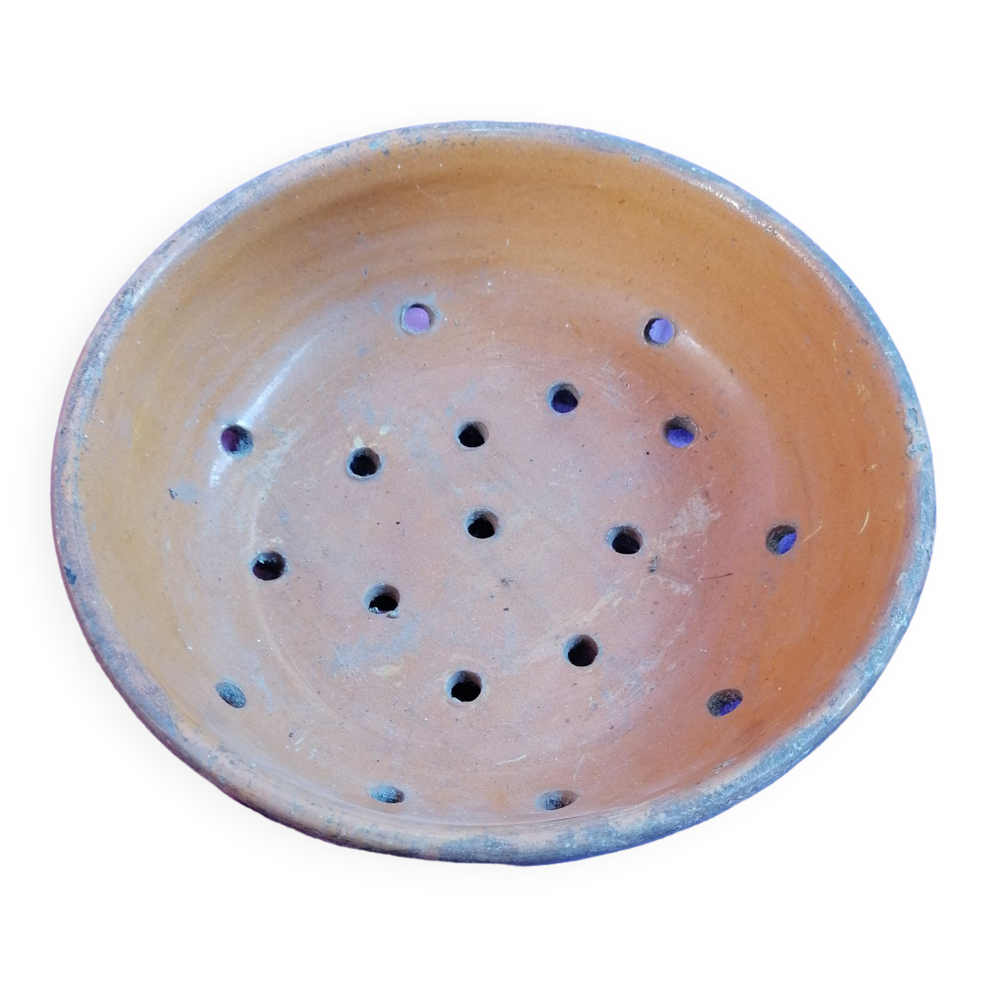 Old dish drainer in mud