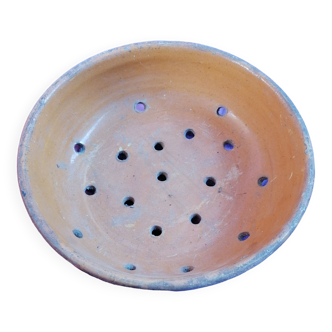 Old dish drainer in mud