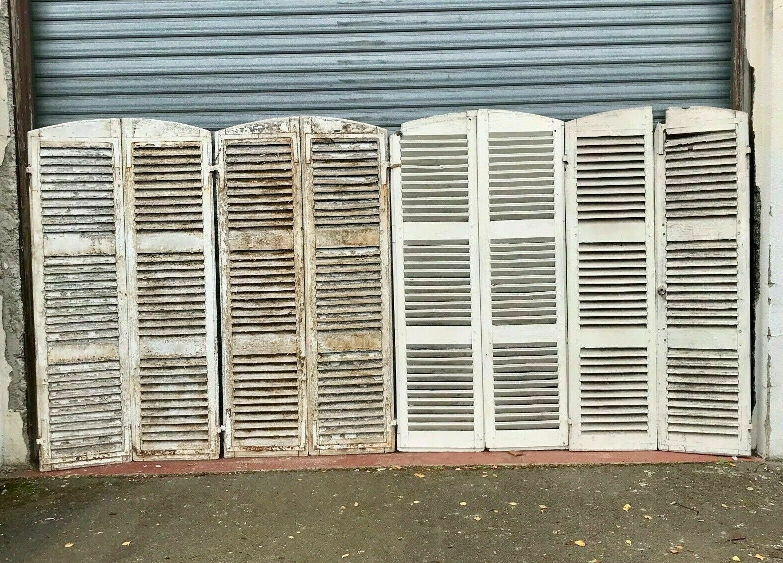 Suite of four pairs of shutters in massive 19th century channel