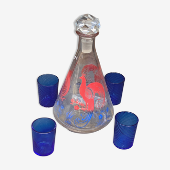 Peacock pattern liqueur decanter and 4 small vintage cobalt blue glasses