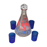 Peacock pattern liqueur decanter and 4 small vintage cobalt blue glasses