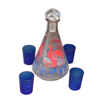 Peacock pattern liqueur decanter and 4 small vintage cobalt blue glasses