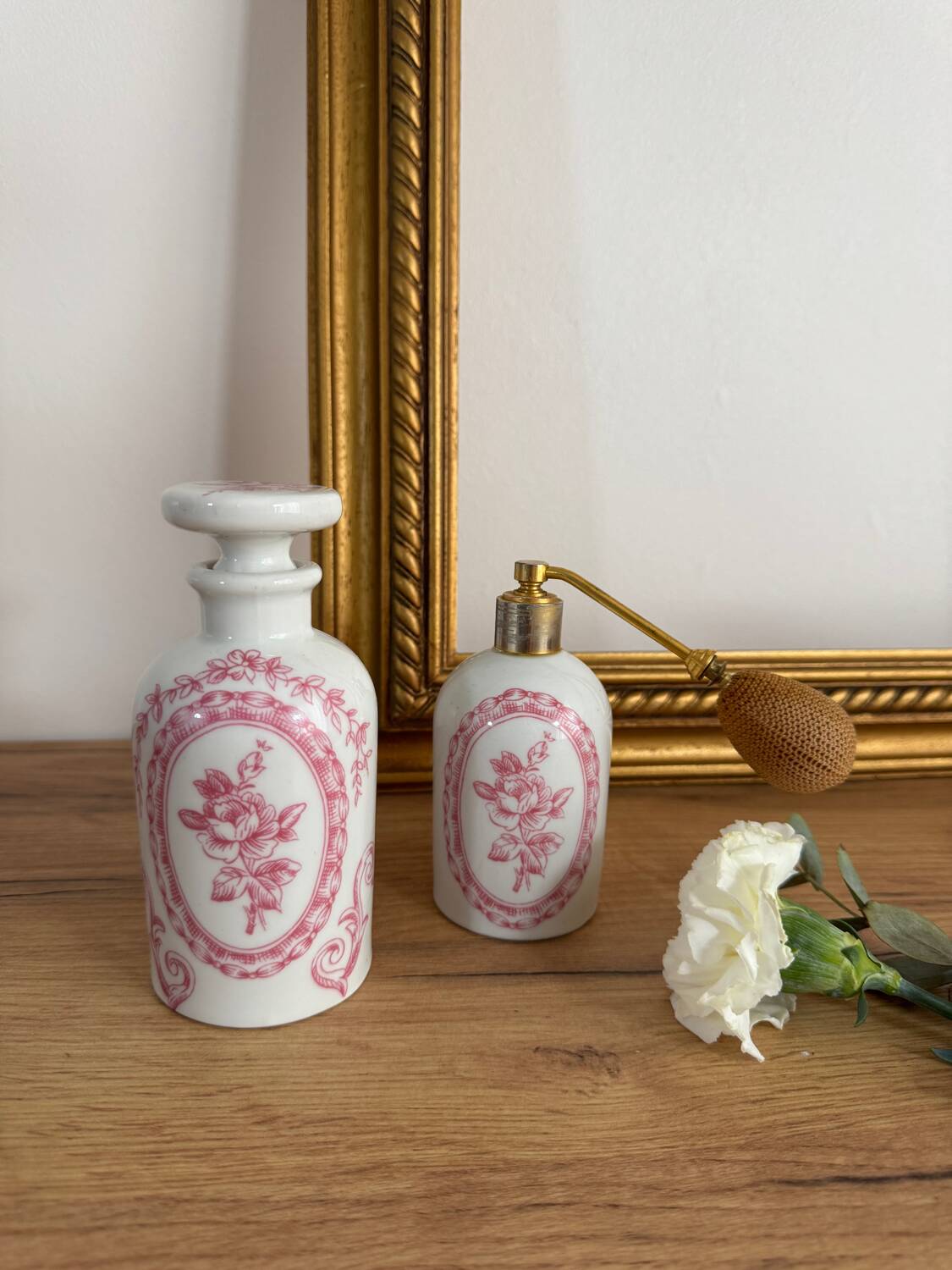 Vintage perfume bottle and spray.