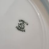 Set of eight Limoges porcelain plates