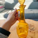 Yellow decanter with handle and spout