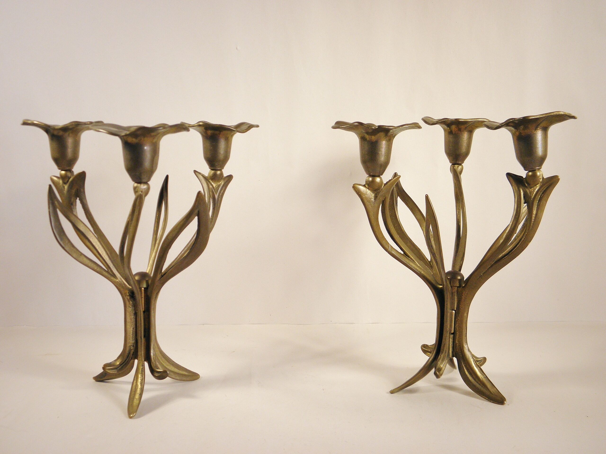Pair of candlesticks three fires in brass