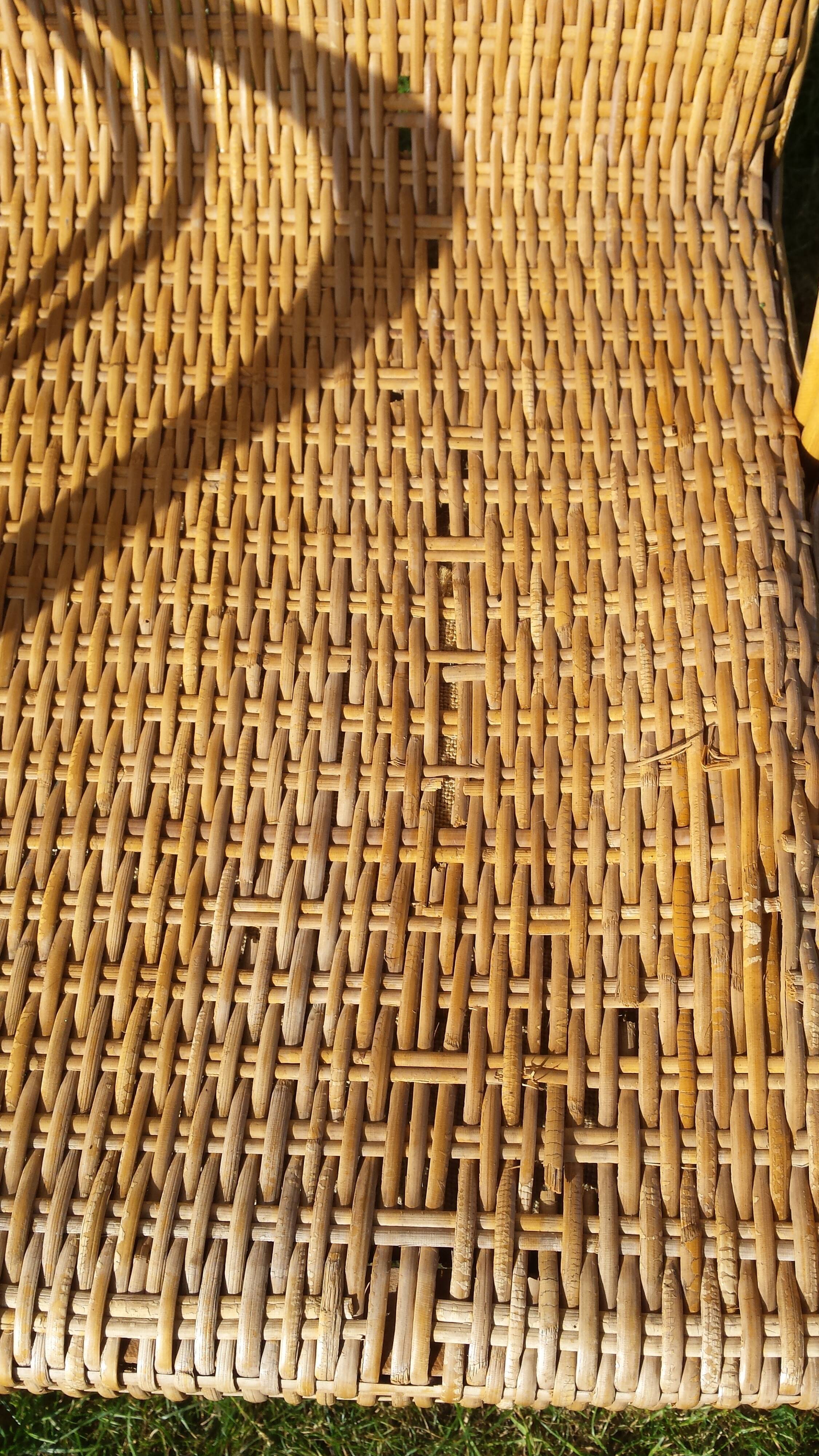 Wicker or rattan armchairs and bamboo