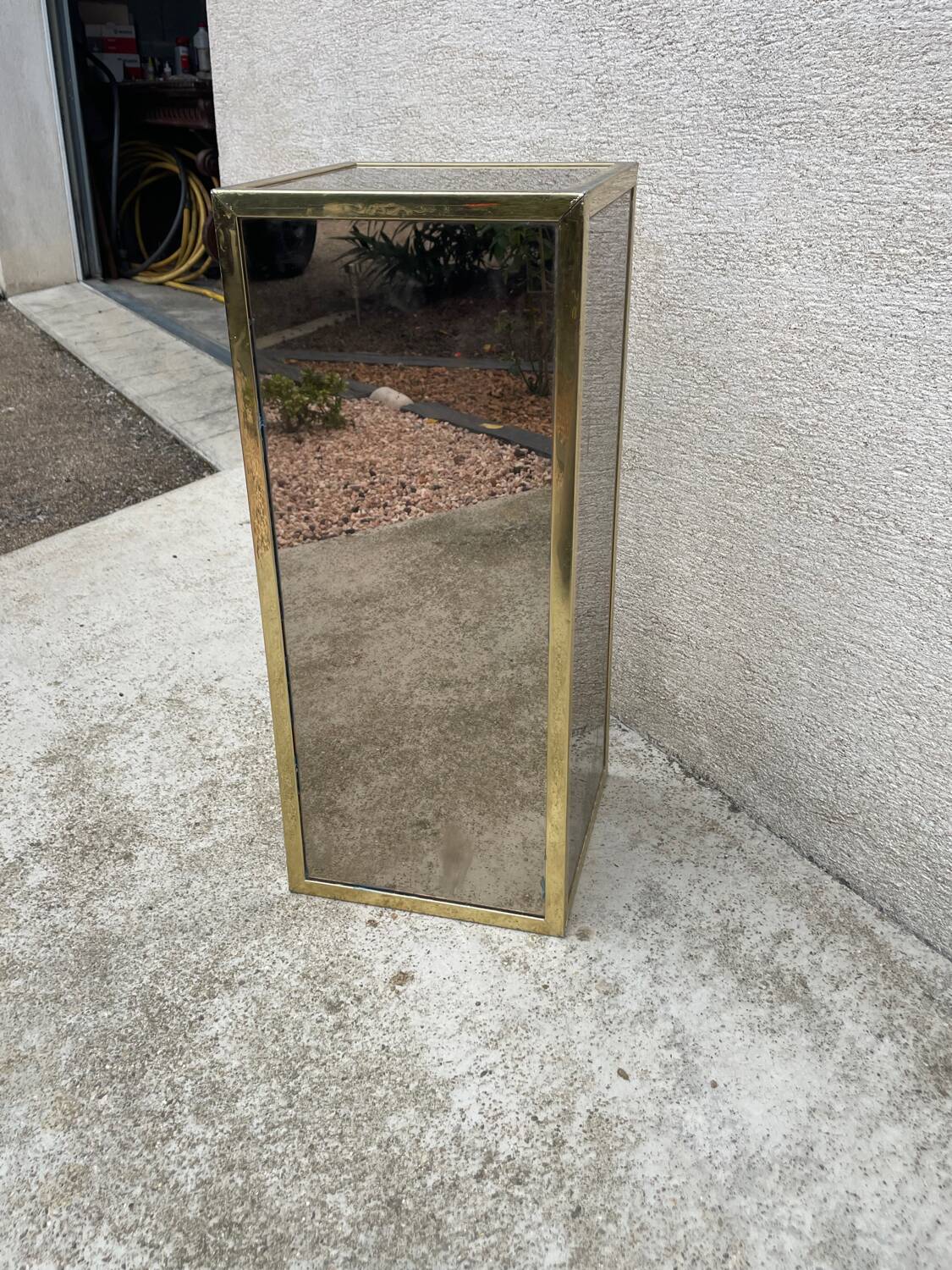 Wooden pedestal / corner column in chrome plated multi-sided mirror