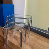 Nesting tables in chrome metal and white glass