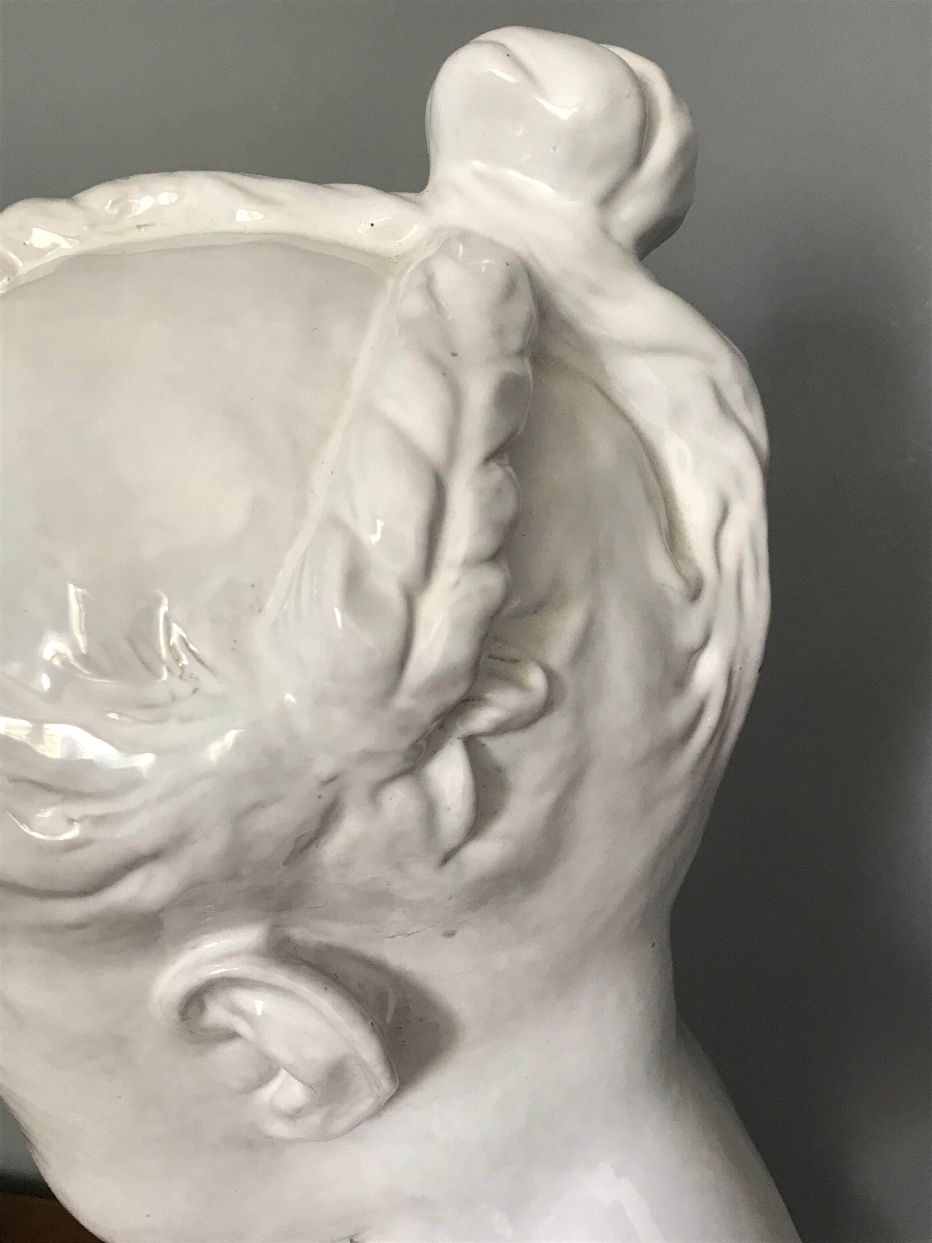 Child bust in enamelled terracotta