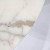 Tulip dining table in marble by Eero Saarinen for Knoll International.