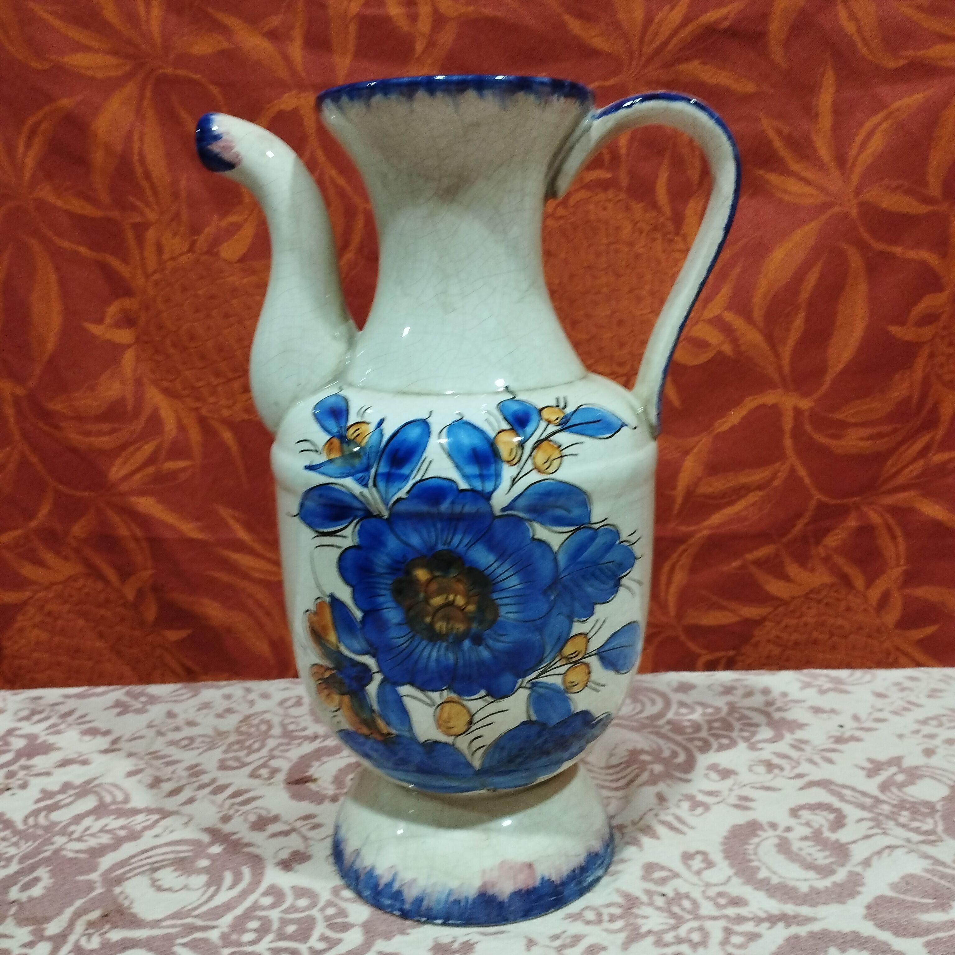 Hand-painted cracked ceramic pitcher