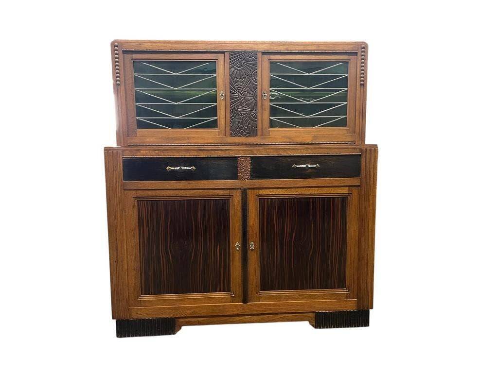 Vintage Art Deco display cabinet in wood with green stained glass.