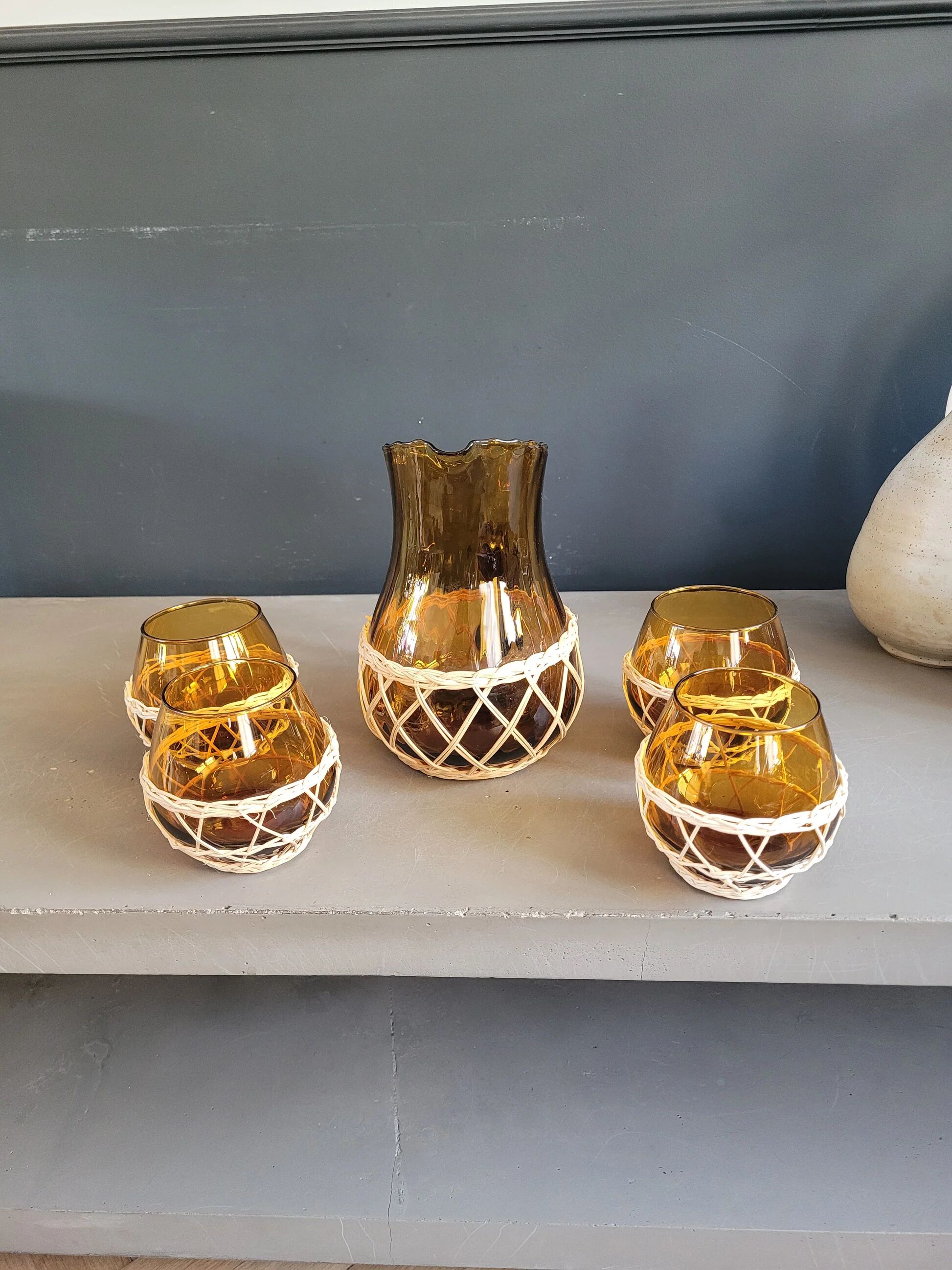 Amber glass and wicker lemonade service