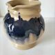 handcrafted ceramic jug with navy blue drip glaze.