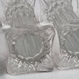 Set of four glass covered doors in the shape of Corinthian columns