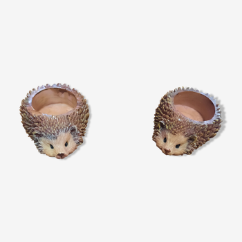 Pair of hedgehog candle holders