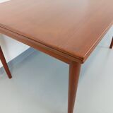 Vintage Scandinavian style dining table from the 50s and 60s in teak with extensions
